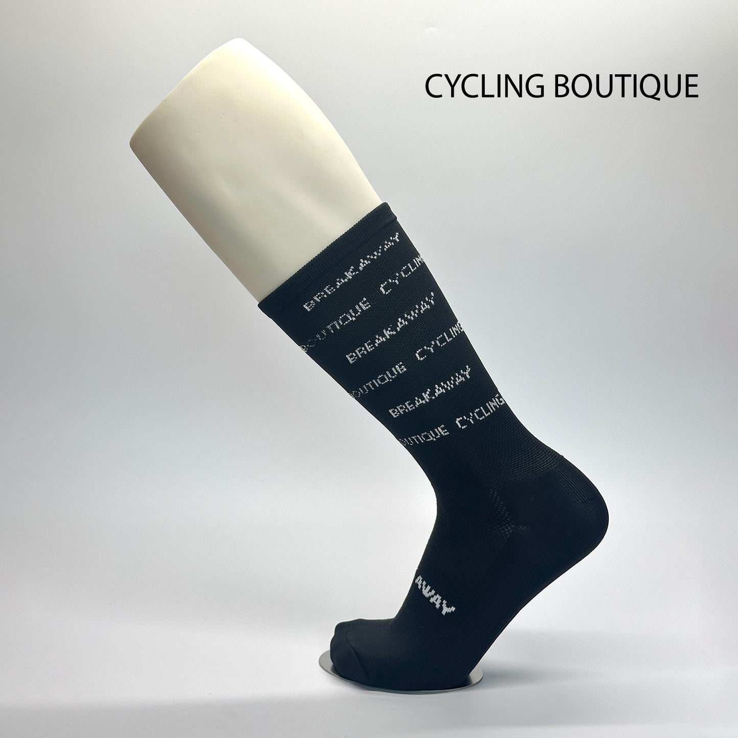 Calcetas personalizadas de ciclismo para cycling boutique con patrón de "cycling boutique" y "fly away" 