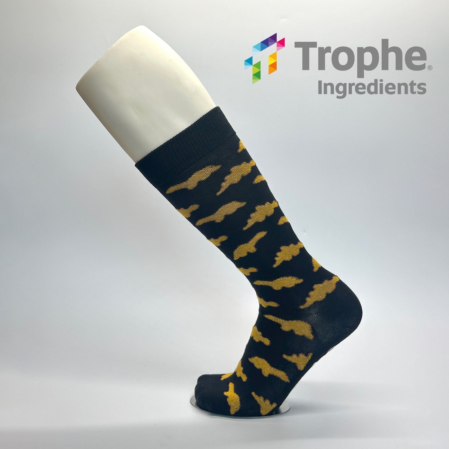 Calcetas de vestir personalizadas en base negra con patrón de nuggets de dinosaurio para empresa Tophe ingredientes. 